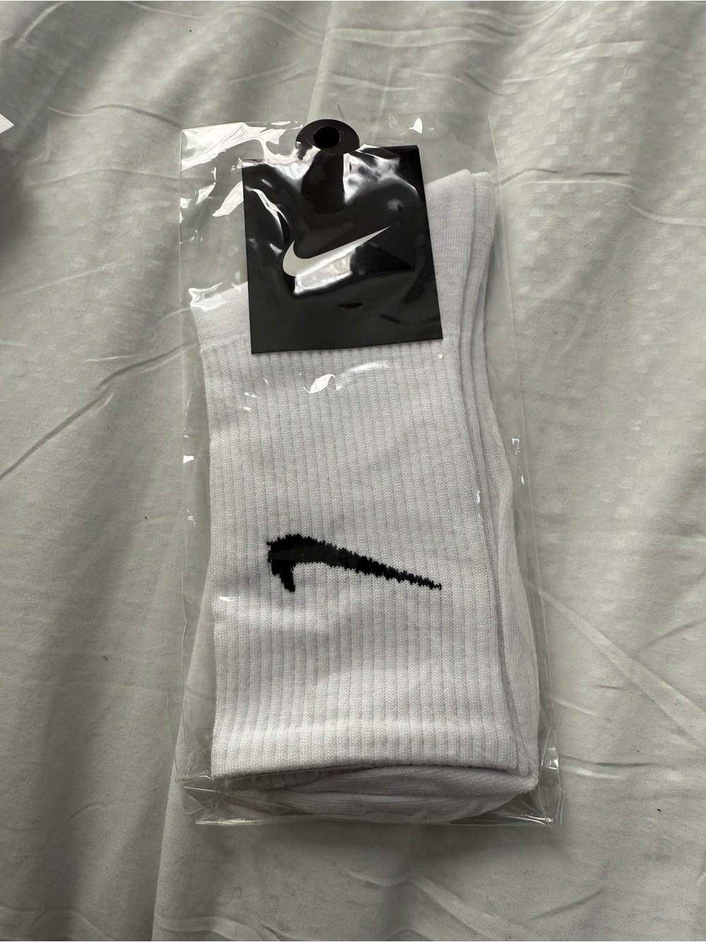 Nike White Crew Socks with Black Swoosh